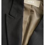 Sort jakkesæt med brun indvendig foring, åben for at afsløre mærket "JJXX."