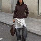 Modelfoto af pige med brun ALLIE jakke. Fra BySofieSønderby