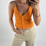 Modelbillede af orange BARBARA cardigan. Set forfra. Fra BySofieSønderby