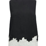 Produktbillede af sort DALME top med hvide blonder. Set forfra. Fra BySofieSønderby