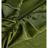 Detaljebillede af grøn JANE kjole. BySofieSønderby.