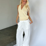 Modelbillede af JORDAN halterneck top, gul. Fra BySofieSønderby