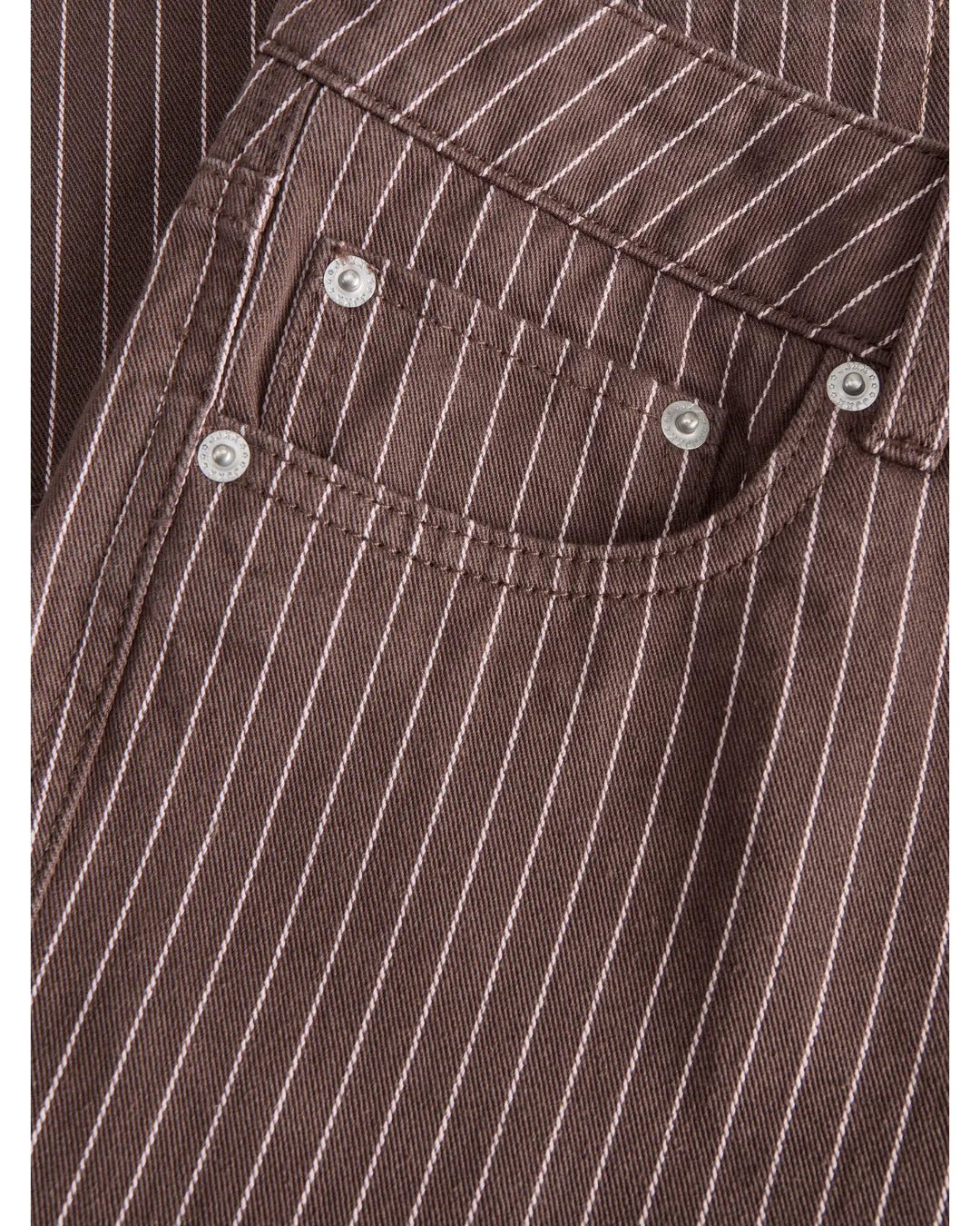 Detaljebillede af brun/lyserød MADDY bukser. Fra BySofieSønderby.