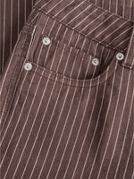 Detaljebillede af brun/lyserød MADDY bukser. Fra BySofieSønderby.