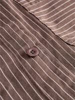 Detaljebillede af brun/lyserød MADDY jakke. Fra BySofieSønderby.