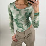 Stemningsbillede af pige der bærer en grøn MALLE.  Fra BySofieSønderby