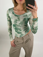 Stemningsbillede af pige der bærer en grøn MALLE.  Fra BySofieSønderby