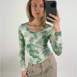 Stemningsbillede af pige der bærer en grøn MALLE.  Fra BySofieSønderby