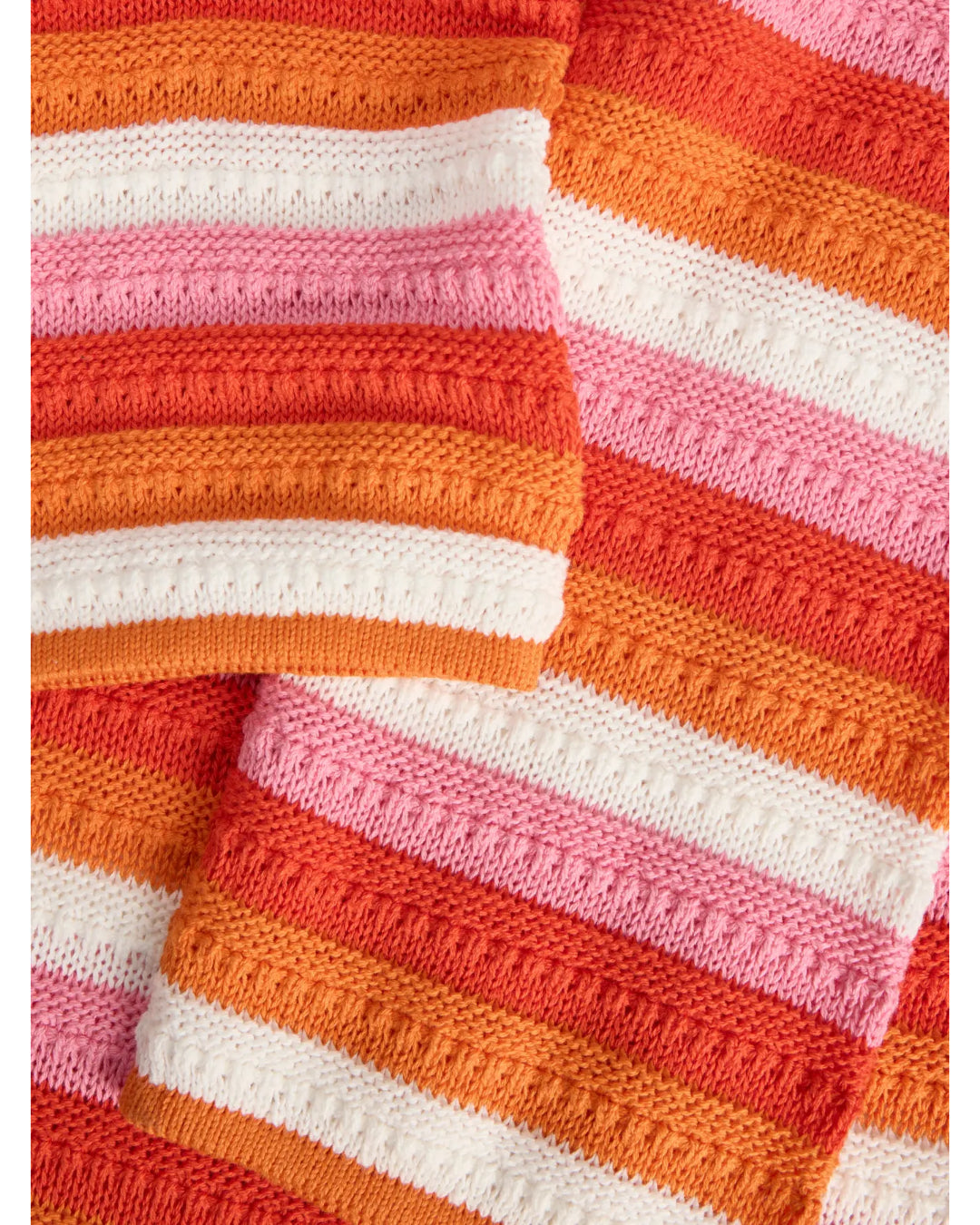 Detaljebillede af orange/pink RORY kjole. Fra BySofieSønderby