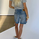 Modelbillede af blå SEVILLE shorts. Set bagfra. Fra BySofieSønderby