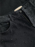 Detaljebillede af sort TOKYO bukser med sorte glimmersten. Fra BySofieSønderby.