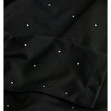 Detaljebillede af sort ZANA bluse med glimmerdetalje. Fra BySofieSønderby.